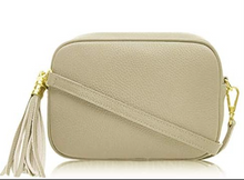 Ami leather cross-body bag with straps
